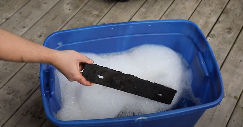 Place heat tents in hot soapy water