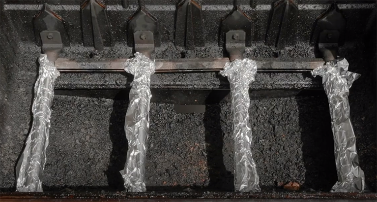 Wrapped heating elements in aluminum foil