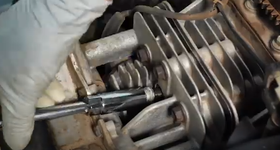 Removal of the spark plug.