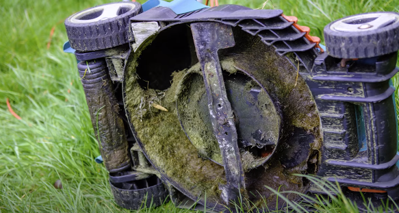 Lawn mower on its side