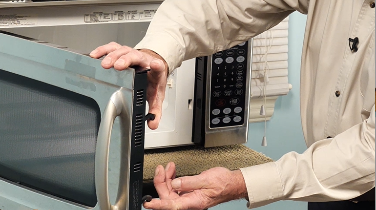 Check the microwave door interlock switch