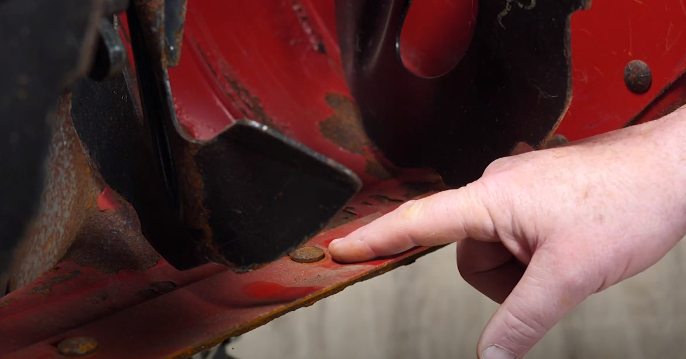Snowblower scraper