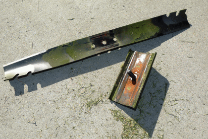 Old Mower Blade and Mount Plate