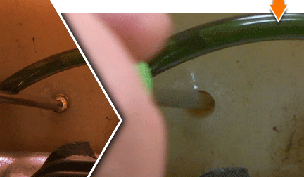 Push the stem into the tank