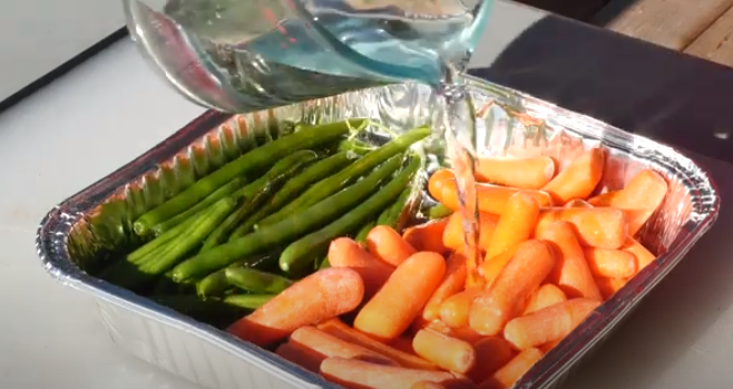 Add water to the green beans and carrots