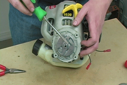 Strike the Last Clutch Plate with a Screwdriver and Hammer