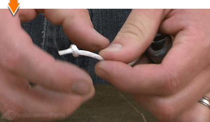 Tie a knot in the handle rope