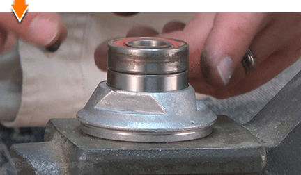Use old bearing to tap with hammer